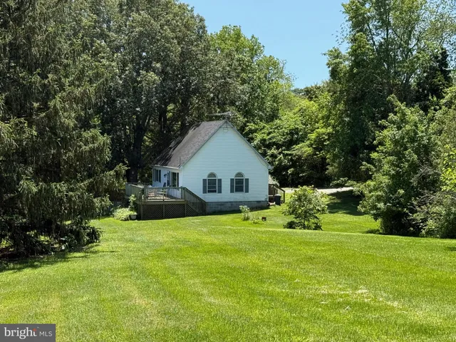 a view of a garden with an outdoor space