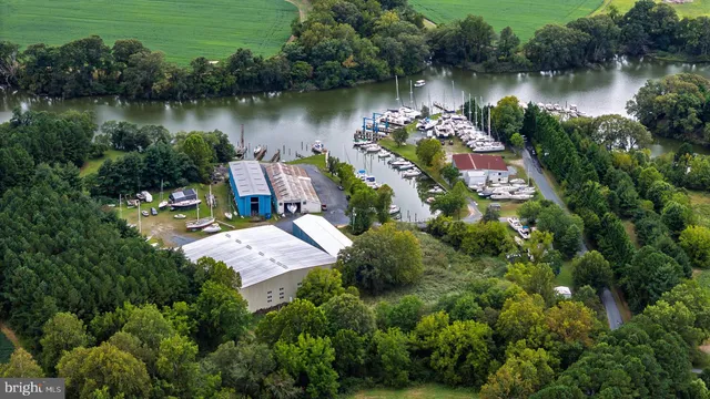 an empty room with a empty shelves and natural light