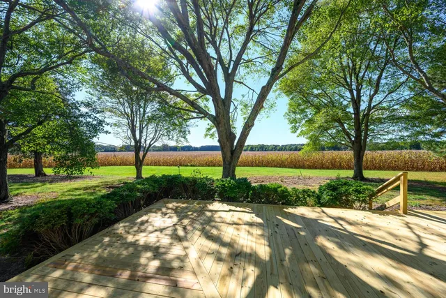 a picture of a bench in front of a building