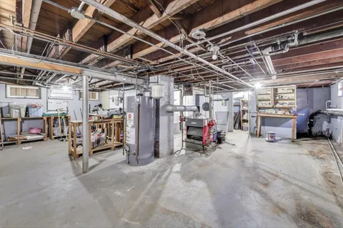 a view of parking garage with cars