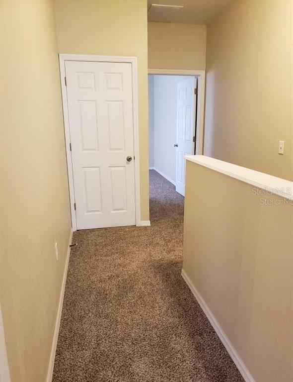 522 Northwest 39th Road, Unit 702 Gainesville, FL 32607 - Photo 11 of 15 an empty room with windows