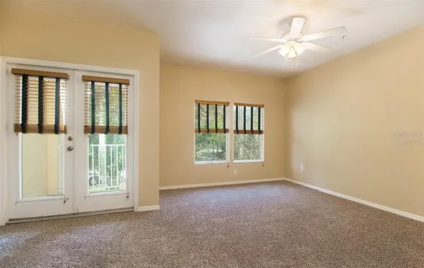 an empty room with windows