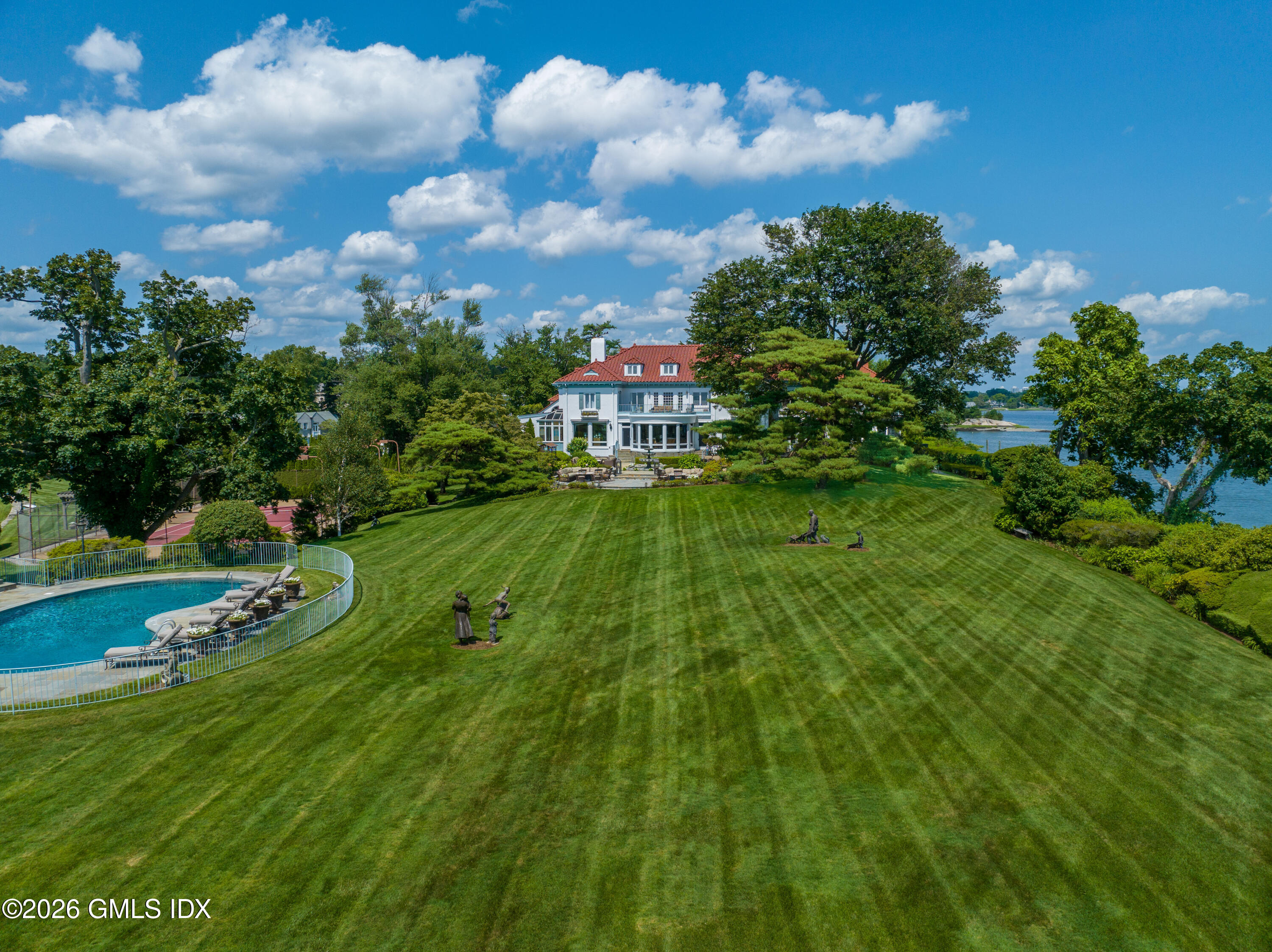 108 Cedar Cliff Road Riverside, CT 06878 - Photo 9 of 49 a view of a golf course with a garden