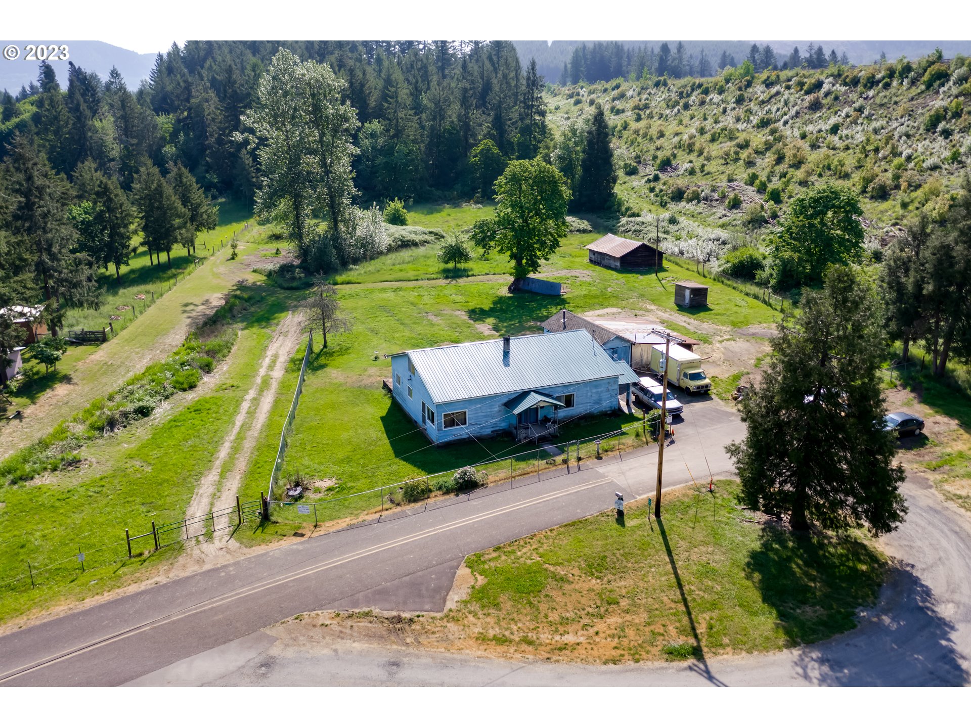 82531 Barbre Road Dexter, OR 97431 - Photo 2 of 18 an aerial view of a house with a yard