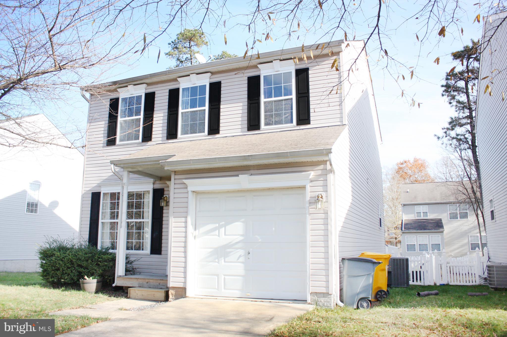 133 Myrtle Avenue Severn, MD 21144 - Photo 2 of 34 Garage with concrete driveway