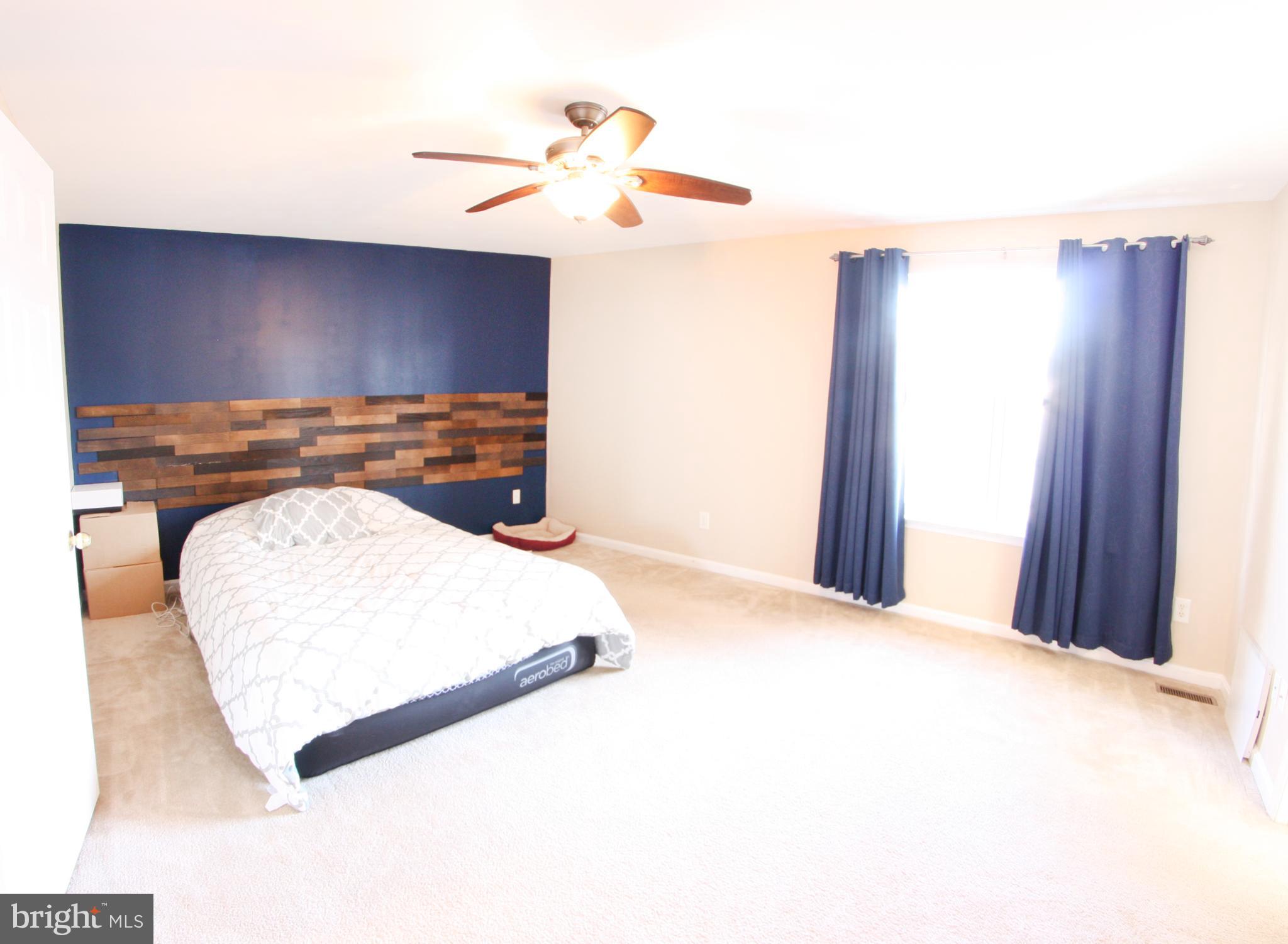 133 Myrtle Avenue Severn, MD 21144 - Photo 13 of 34 Large master bedroom with ceiling fan