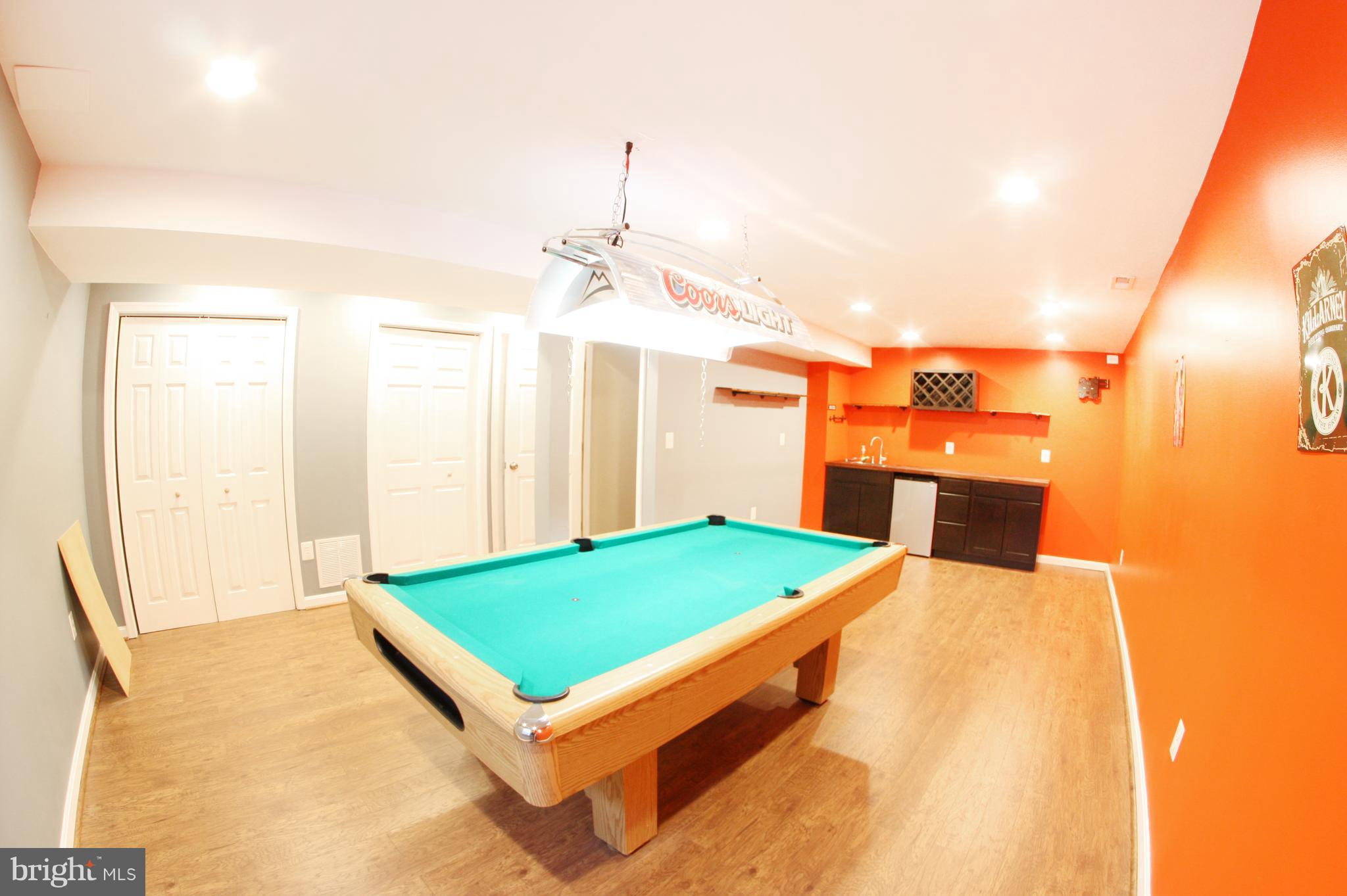 133 Myrtle Avenue Severn, MD 21144 - Photo 21 of 34 Lower level recreation room with wet bar.