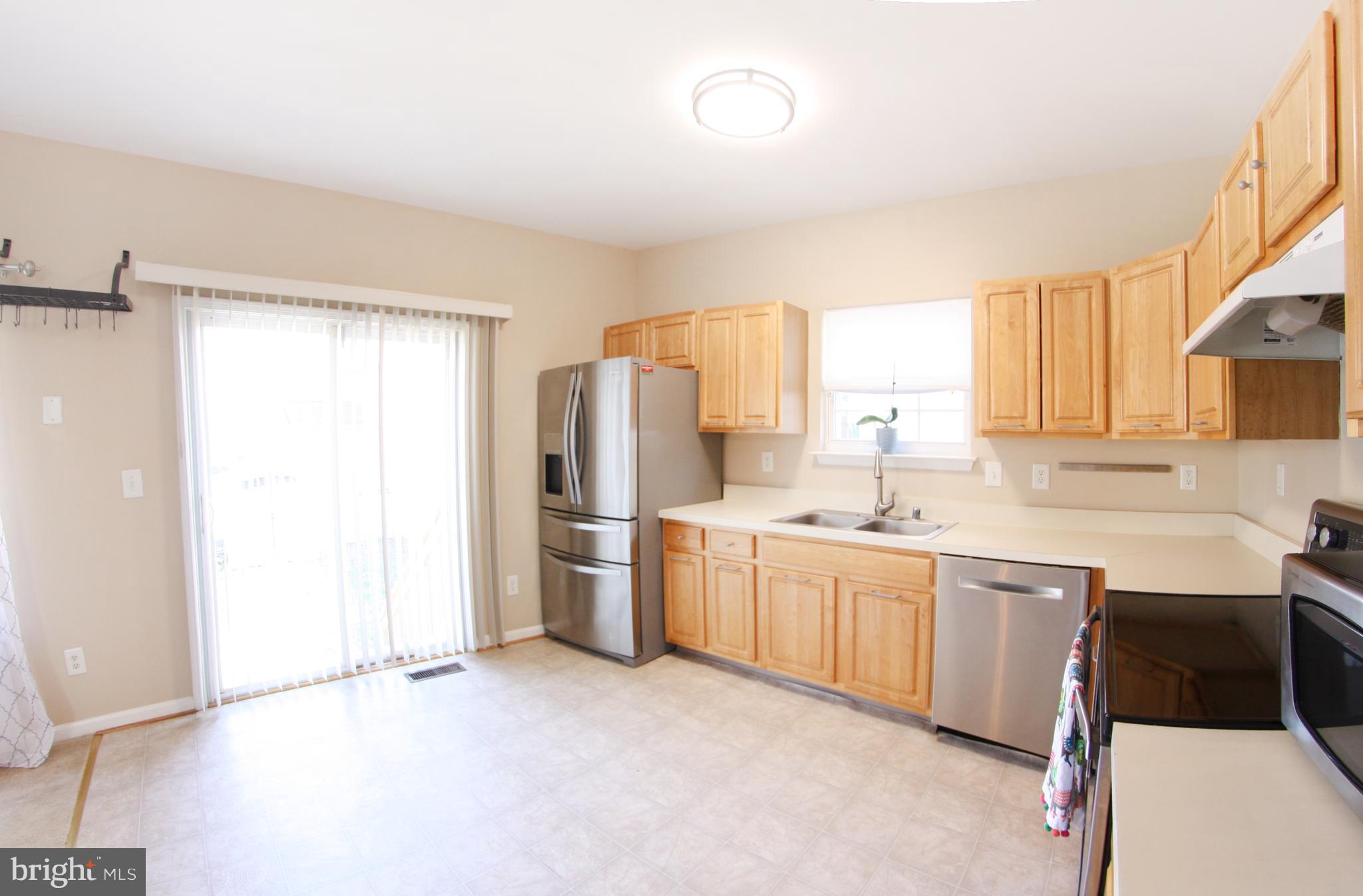 133 Myrtle Avenue Severn, MD 21144 - Photo 5 of 34 Bright kitchen with sliders to rear yard