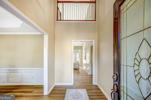 a view of a room with furniture window and wooden floor