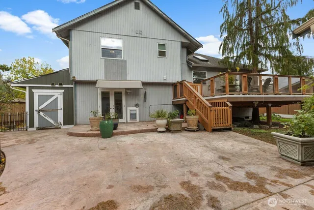 a backyard of a house with seating space