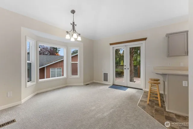 a view of livingroom with furniture and window