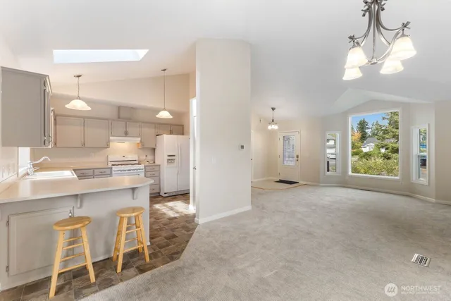a view of a kitchen and a sink