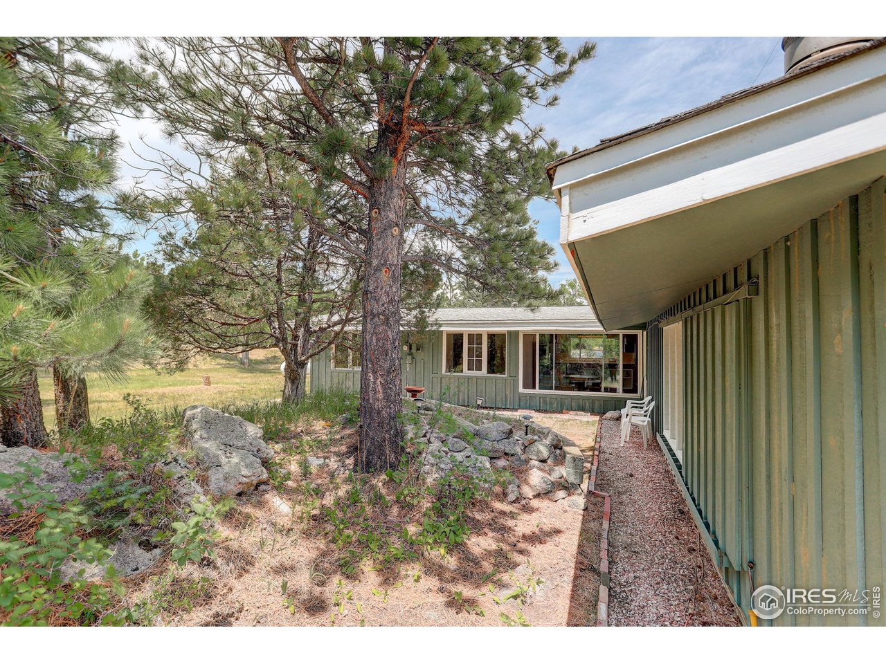 107 Deer Trail Road Boulder, CO 80302 - Photo 1 of 40 a view of house with a yard