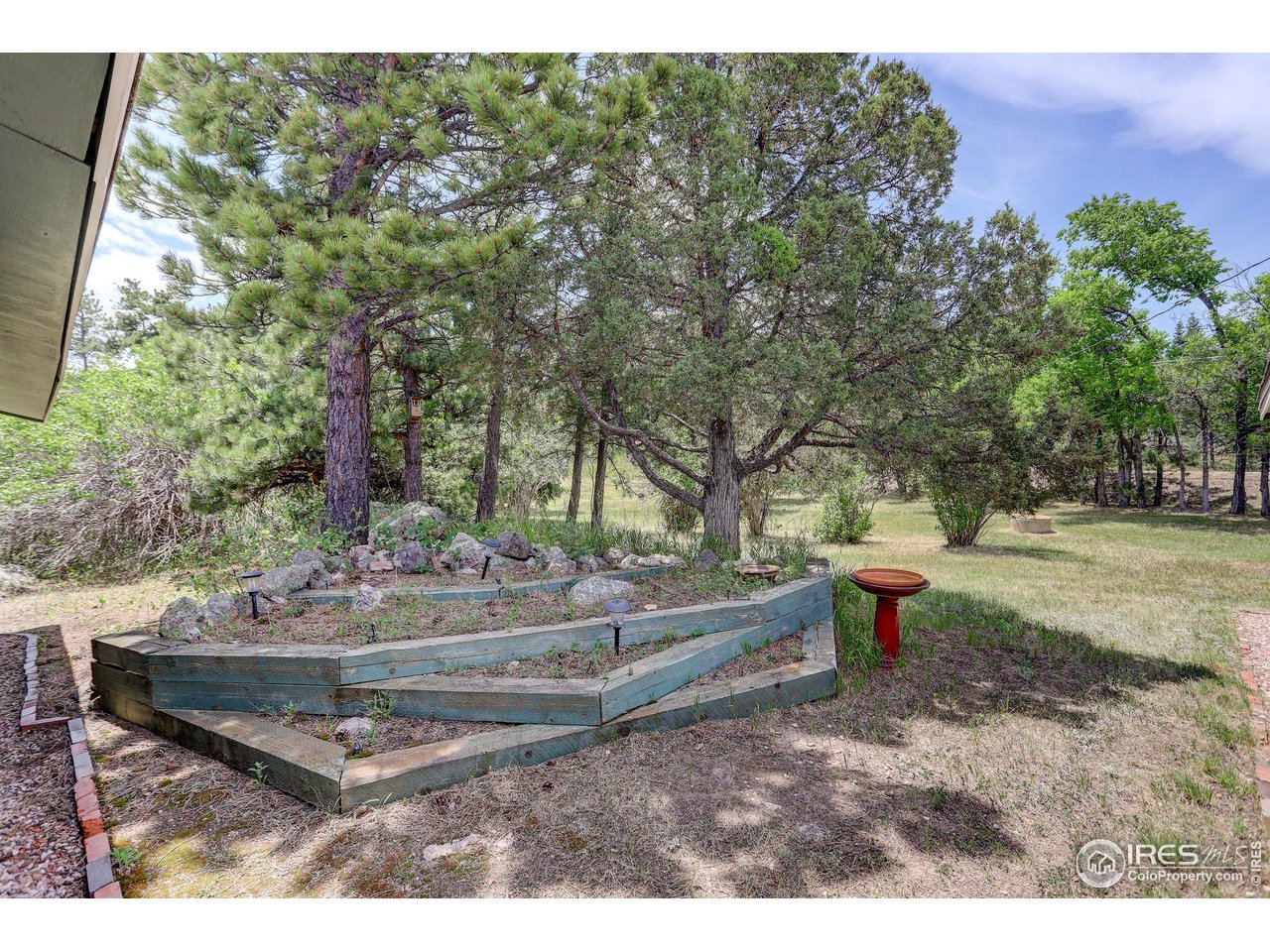 107 Deer Trail Road Boulder, CO 80302 - Photo 15 of 40 a garden view with a seating space