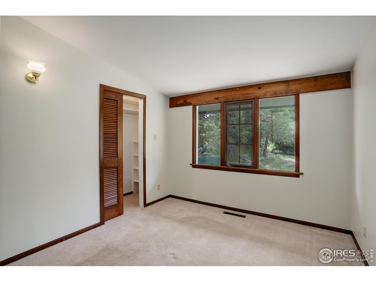 107 Deer Trail Road Boulder, CO 80302 - Photo 25 of 40 a view of an empty room with a window