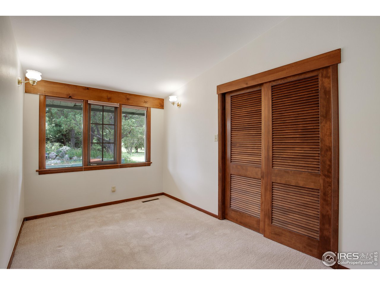 107 Deer Trail Road Boulder, CO 80302 - Photo 27 of 40 a view of an empty room with a window
