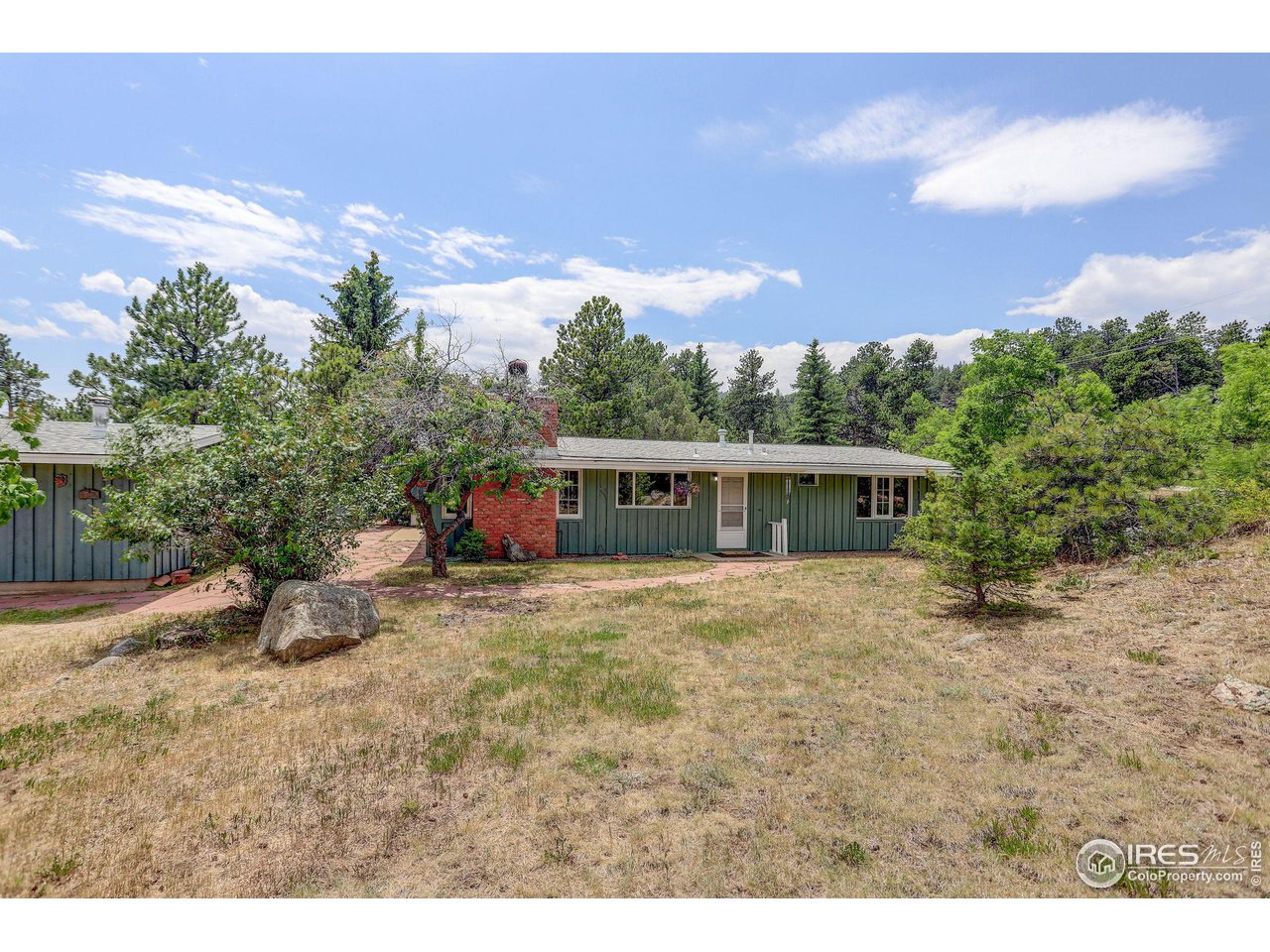 107 Deer Trail Road Boulder, CO 80302 - Photo 7 of 40 a view of a house with a yard