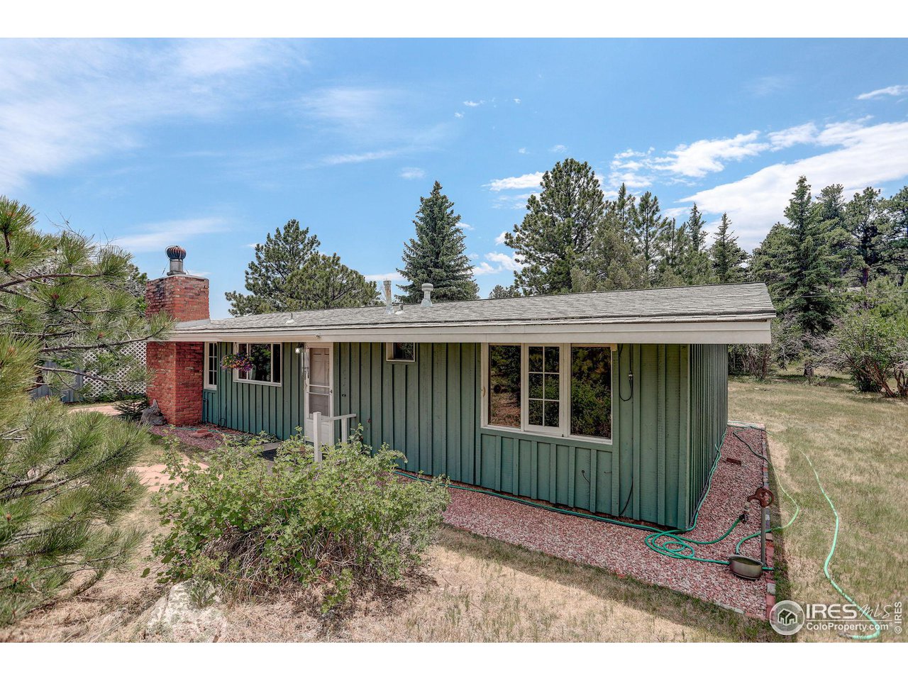 107 Deer Trail Road Boulder, CO 80302 - Photo 8 of 40 a view of backyard with green space
