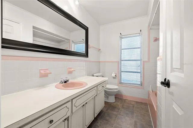 a view of empty room with windows