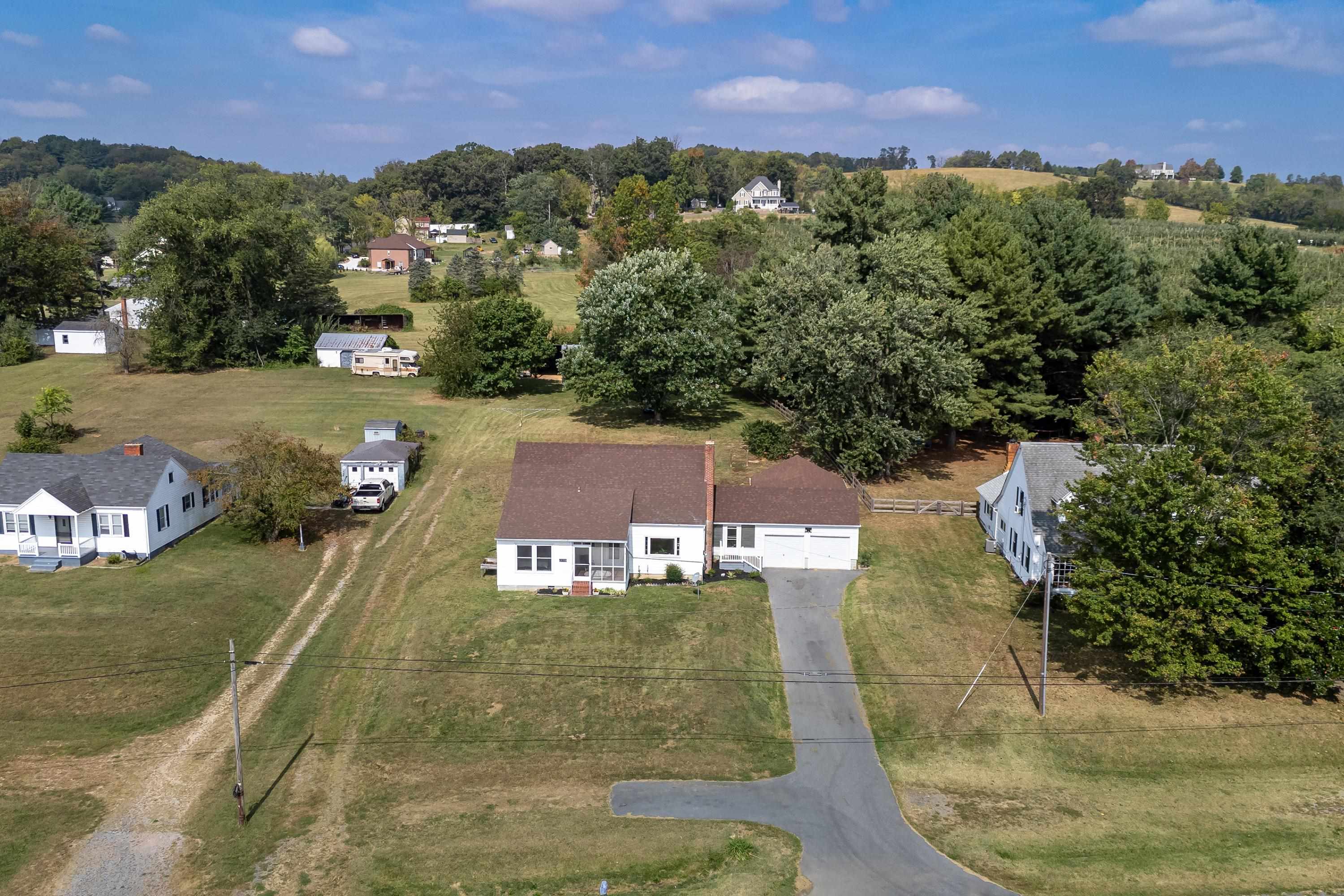 3138 Cross Keys Road Harrisonburg, VA 22801 - Photo 66 of 74 The aerial view highlights the overhead view of the spacious lot, farmland nearby the home, mountains offering beautiful views, and much more!