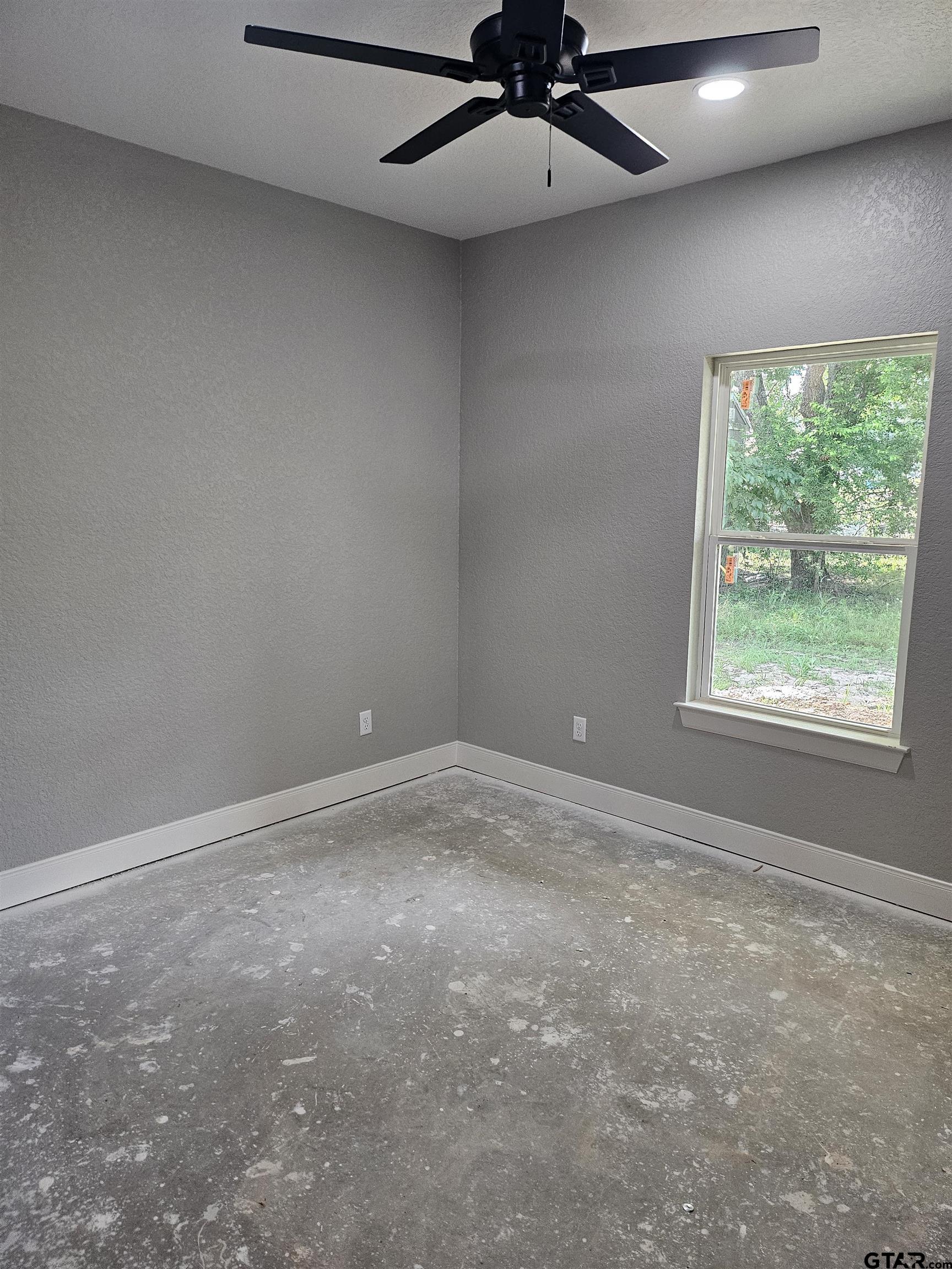 100 Cook Street, Unit 6 Arp, TX 75750 - Photo 3 of 8 an empty room with a window