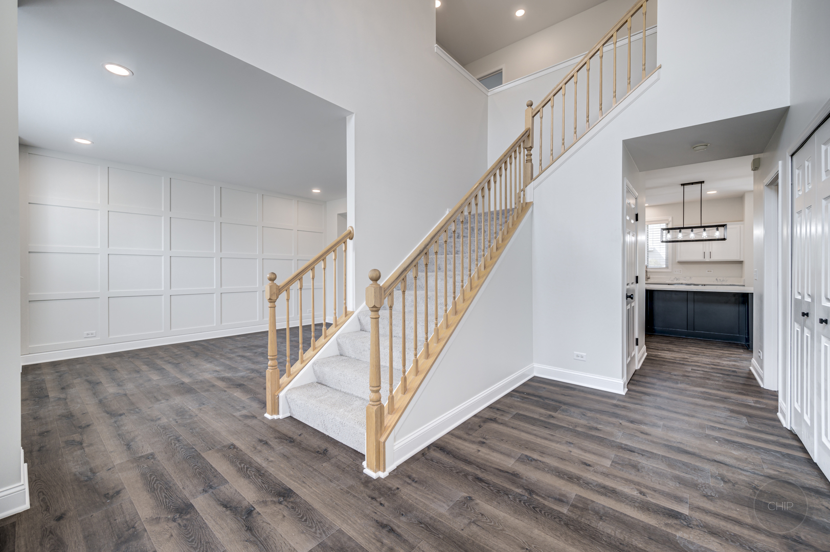 12948 Parterre Place Plainfield, IL 60585 - Photo 2 of 35 a view of entryway and hall with wooden floor