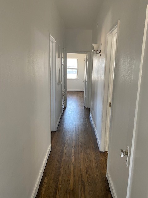 744 Walnut Avenue Long Beach, CA 90813 - Photo 34 of 41 a view of a hallway with wooden floor