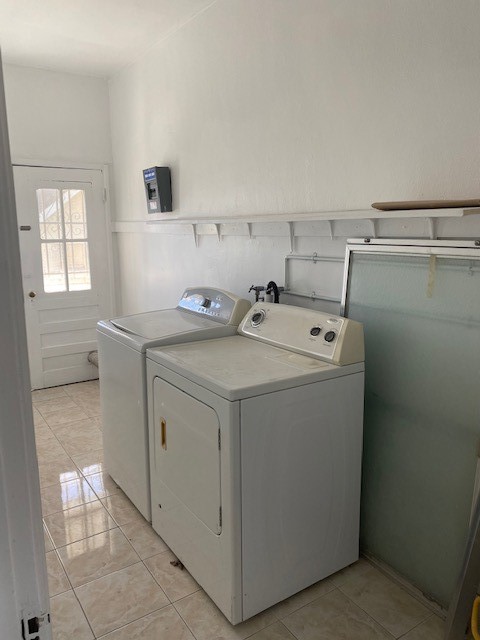 744 Walnut Avenue Long Beach, CA 90813 - Photo 36 of 41 a utility room with dryer and washer