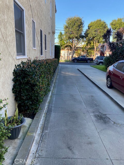 744 Walnut Avenue Long Beach, CA 90813 - Photo 6 of 41 a view of a car park in front of a house