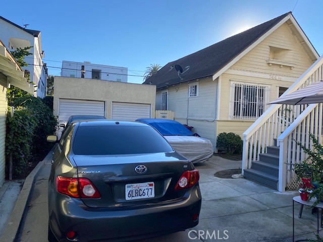 744 Walnut Avenue Long Beach, CA 90813 - Photo 7 of 41 a car parked in front of a house