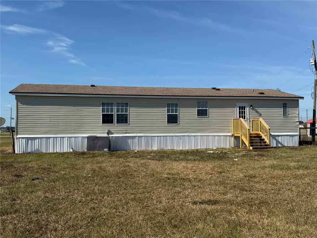 954 Brook Road North Fort Meade, FL 33841 - Photo 19 of 21 a view of back yard of the house