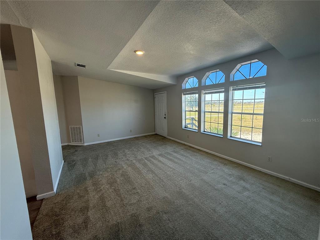 954 Brook Road North Fort Meade, FL 33841 - Photo 5 of 21 an empty room with windows