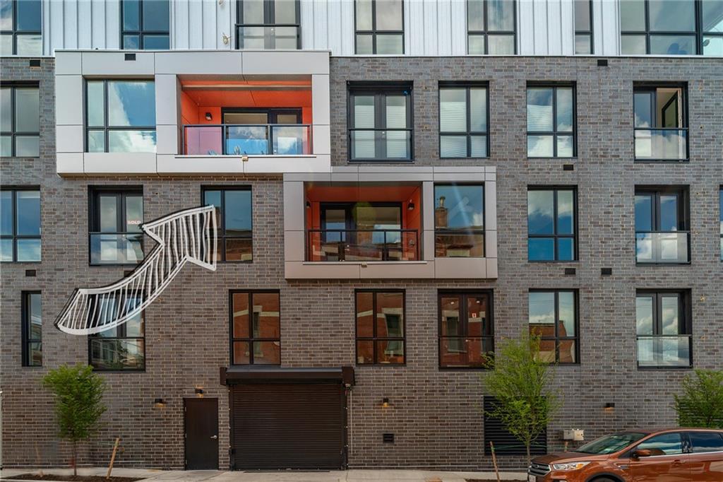 3725 Butler Street, Unit 406 Pittsburgh, PA 15201 - Photo 14 of 21 a front view of a multi story building