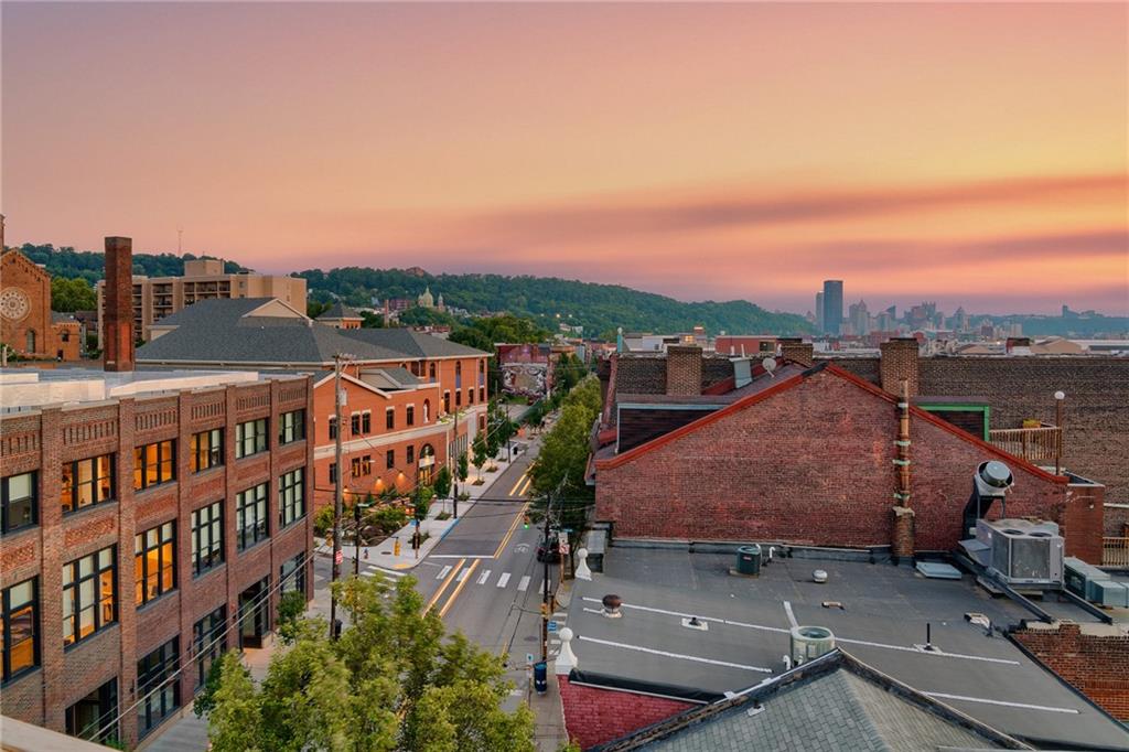 3725 Butler Street, Unit 406 Pittsburgh, PA 15201 - Photo 18 of 21 a view of a city from a terrace