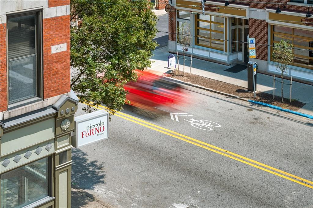 3725 Butler Street, Unit 406 Pittsburgh, PA 15201 - Photo 21 of 21 a sign on the side of a building