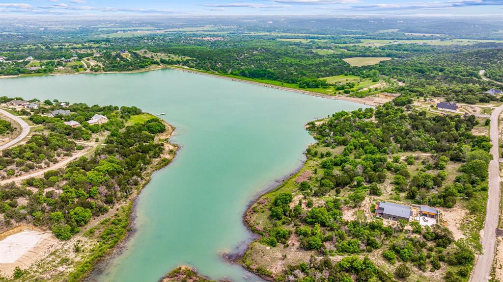 1165 Anchor Way Bluff Dale, TX 76433 - Photo 20 of 40 a view of a lake with a city view