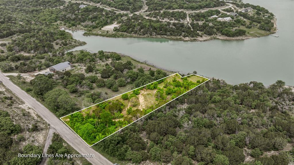 1165 Anchor Way Bluff Dale, TX 76433 - Photo 3 of 40 a view of a lake from a balcony