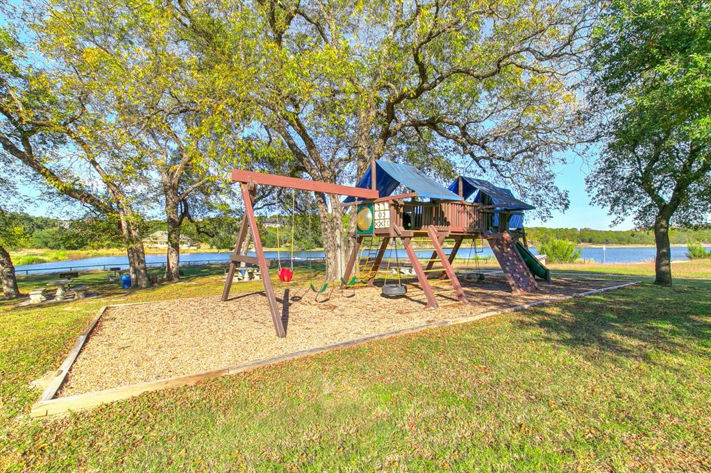 1165 Anchor Way Bluff Dale, TX 76433 - Photo 37 of 40 a view of a swimming pool with a patio