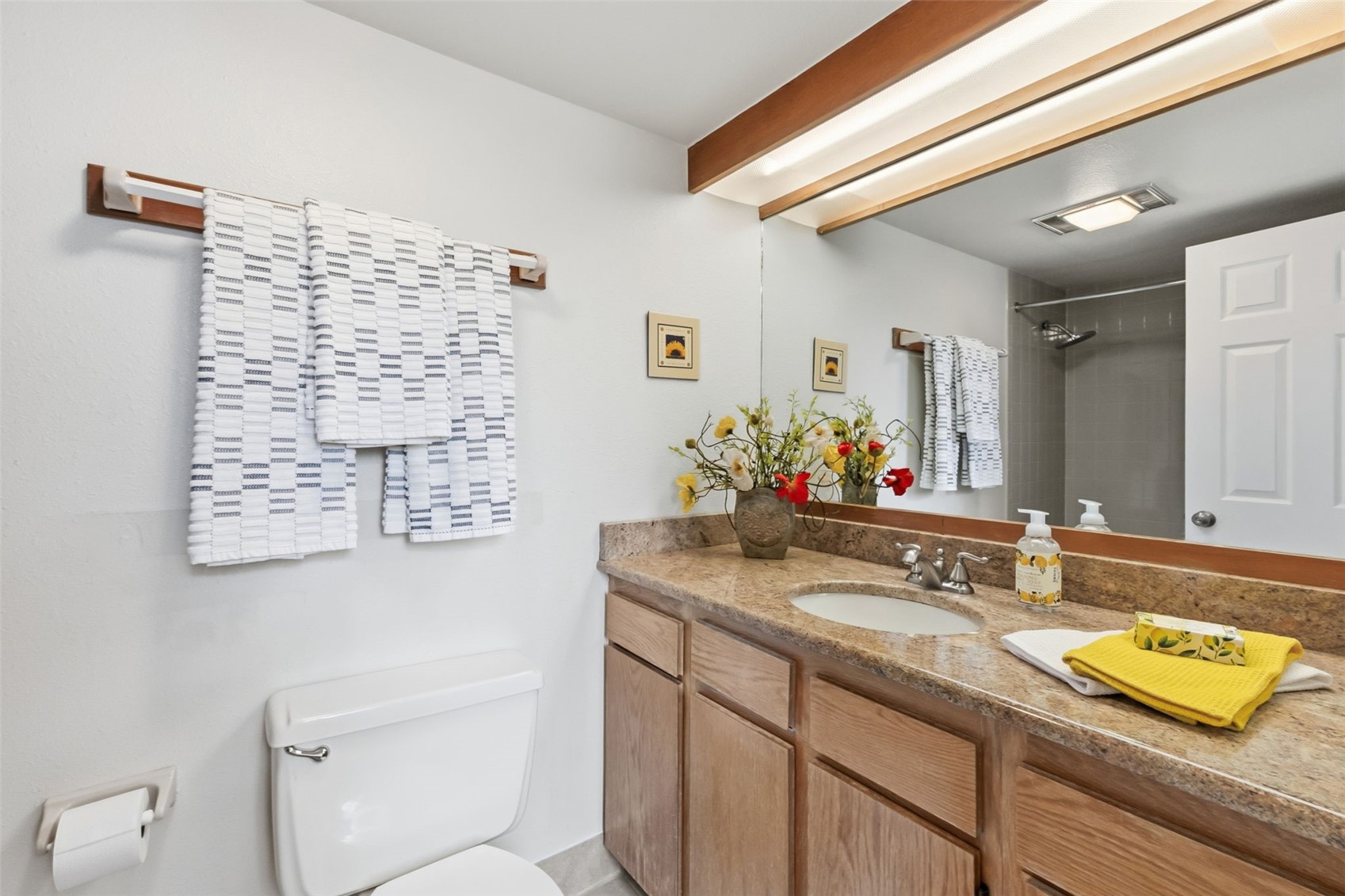 30 Tennis Club Road, Unit 1608 Keystone, CO 80435 - Photo 24 of 29 a bathroom with a granite countertop sink and a mirror