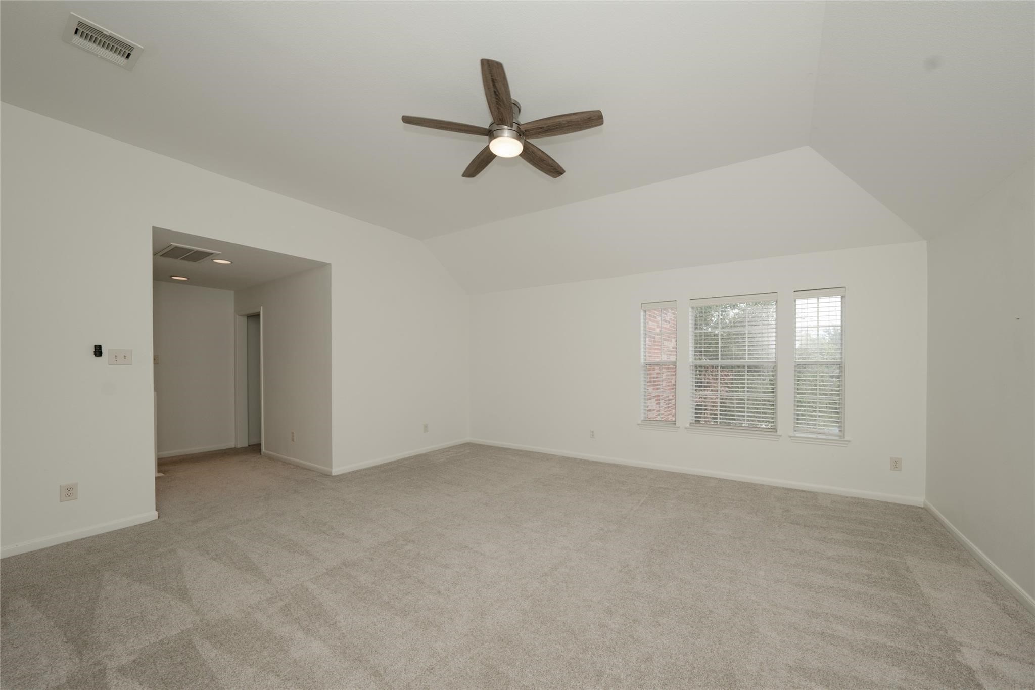 14830 Barton Grove Lane Humble, TX 77396 - Photo 21 of 36 wooden floor in an empty room with a window