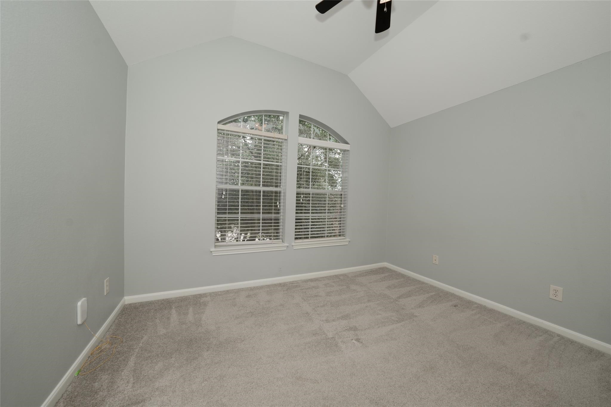 14830 Barton Grove Lane Humble, TX 77396 - Photo 23 of 36 an empty room with windows