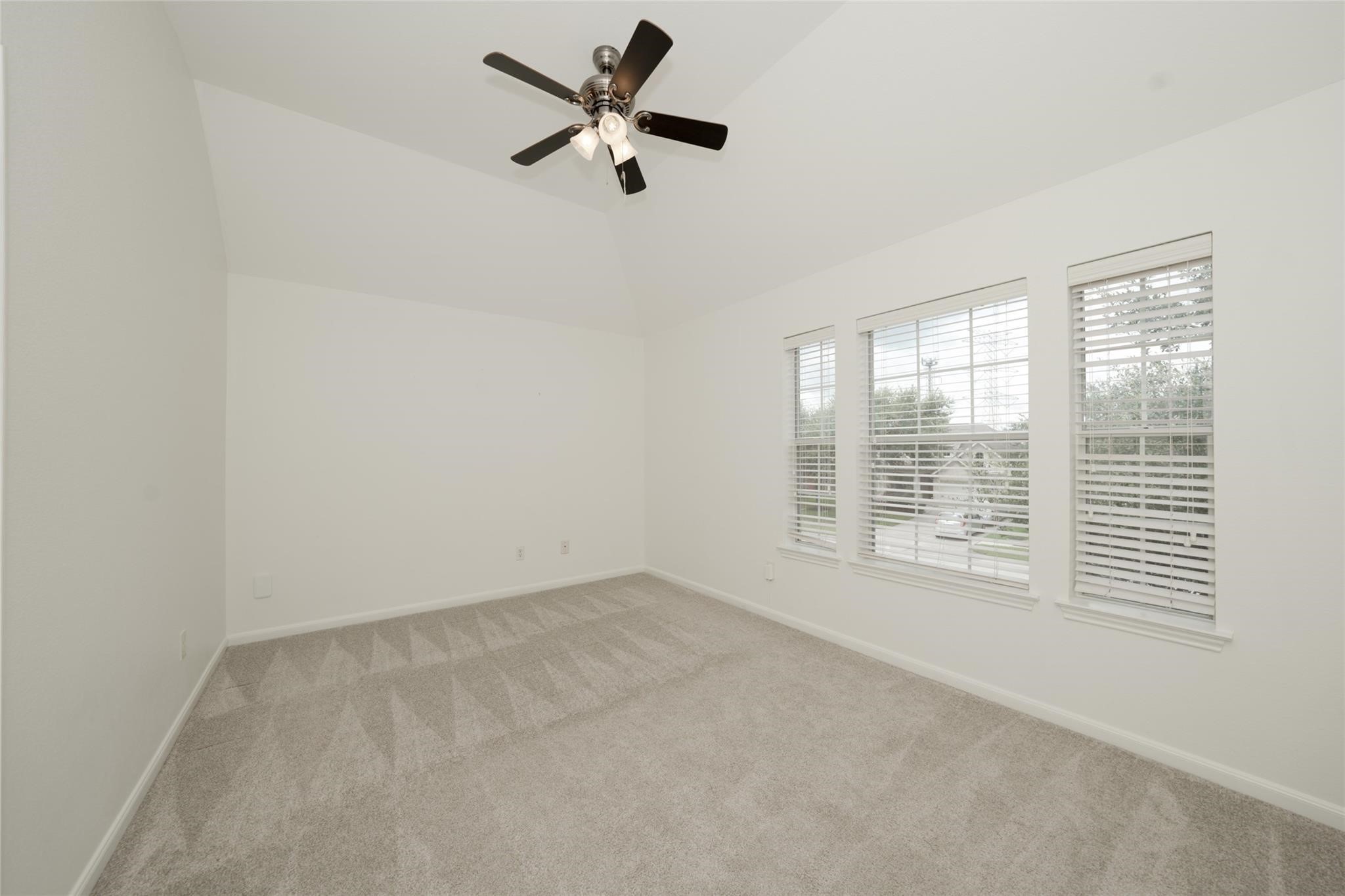 14830 Barton Grove Lane Humble, TX 77396 - Photo 24 of 36 an empty room with a window