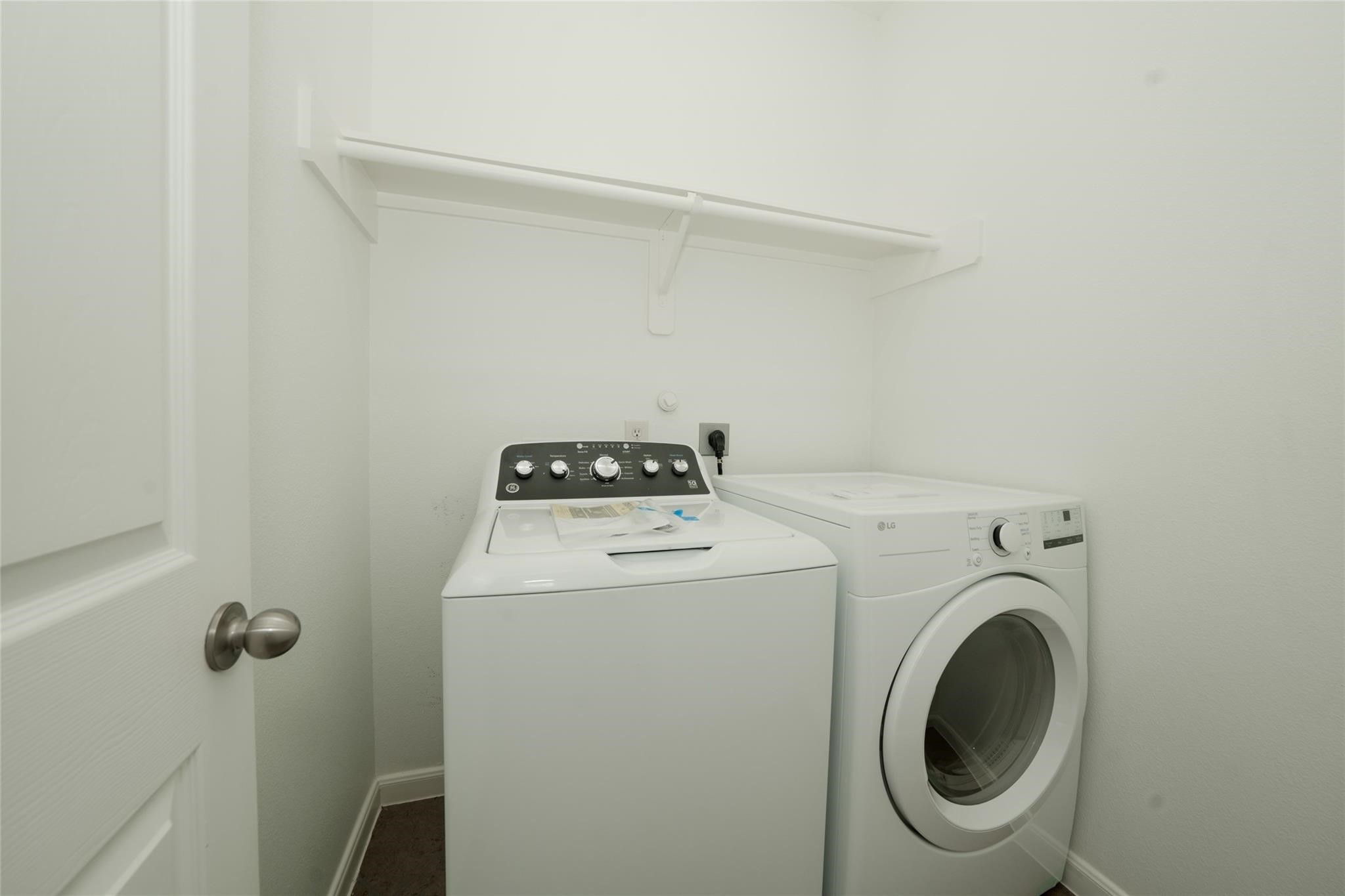 14830 Barton Grove Lane Humble, TX 77396 - Photo 29 of 36 a utility room with dryer and washer
