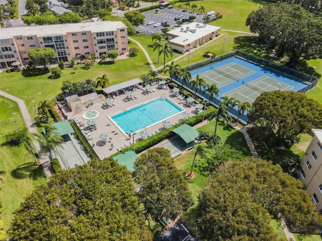 an aerial view of a house with a garden
