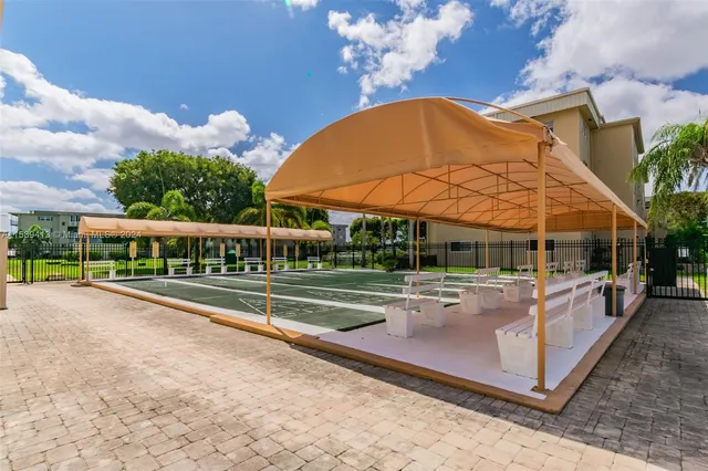 a view of a house with a swimming pool