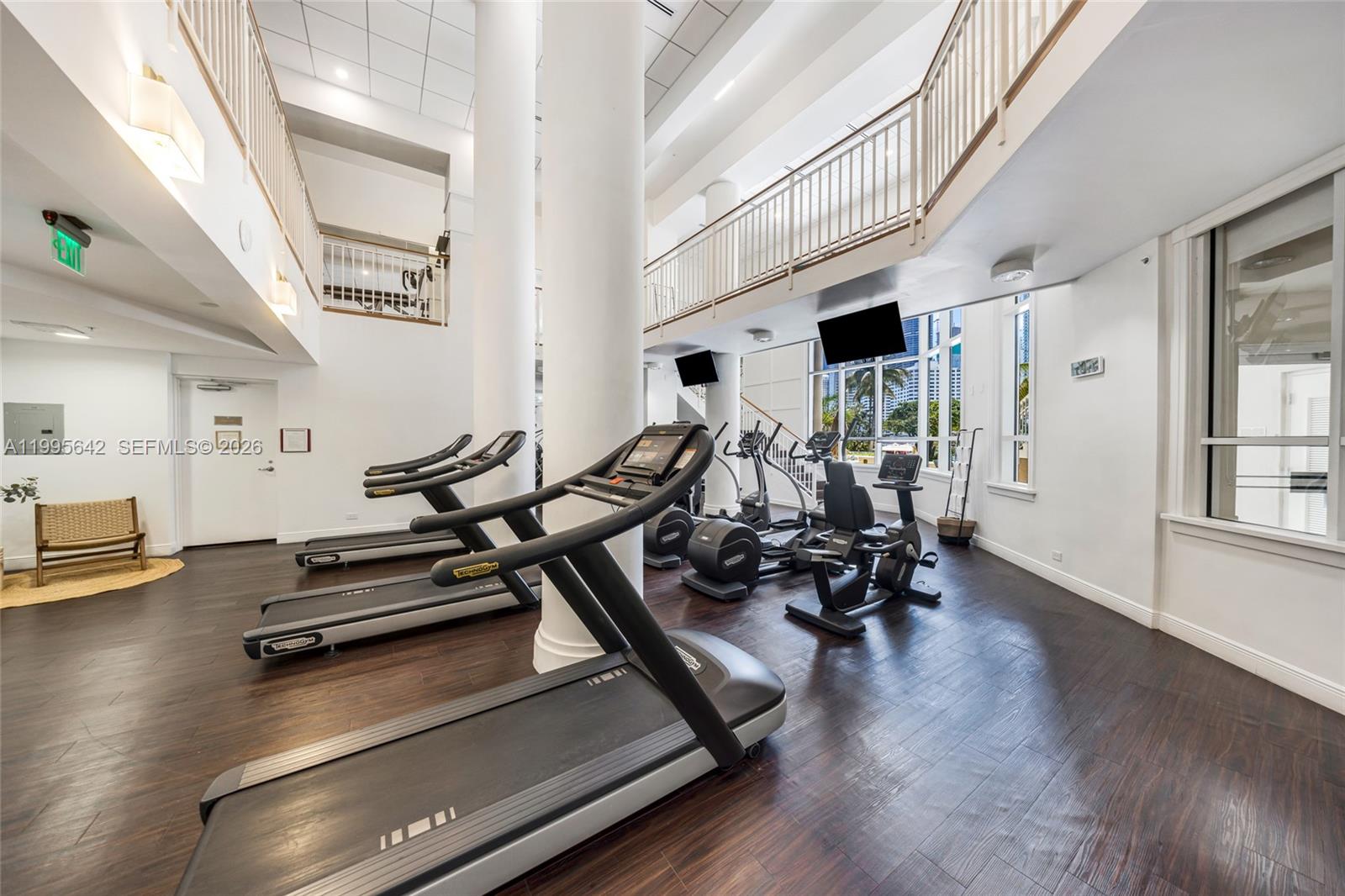 701 Brickell Key Boulevard, Unit 1112 Miami, FL 33131 - Photo 27 of 31 a view of a room with gym equipment