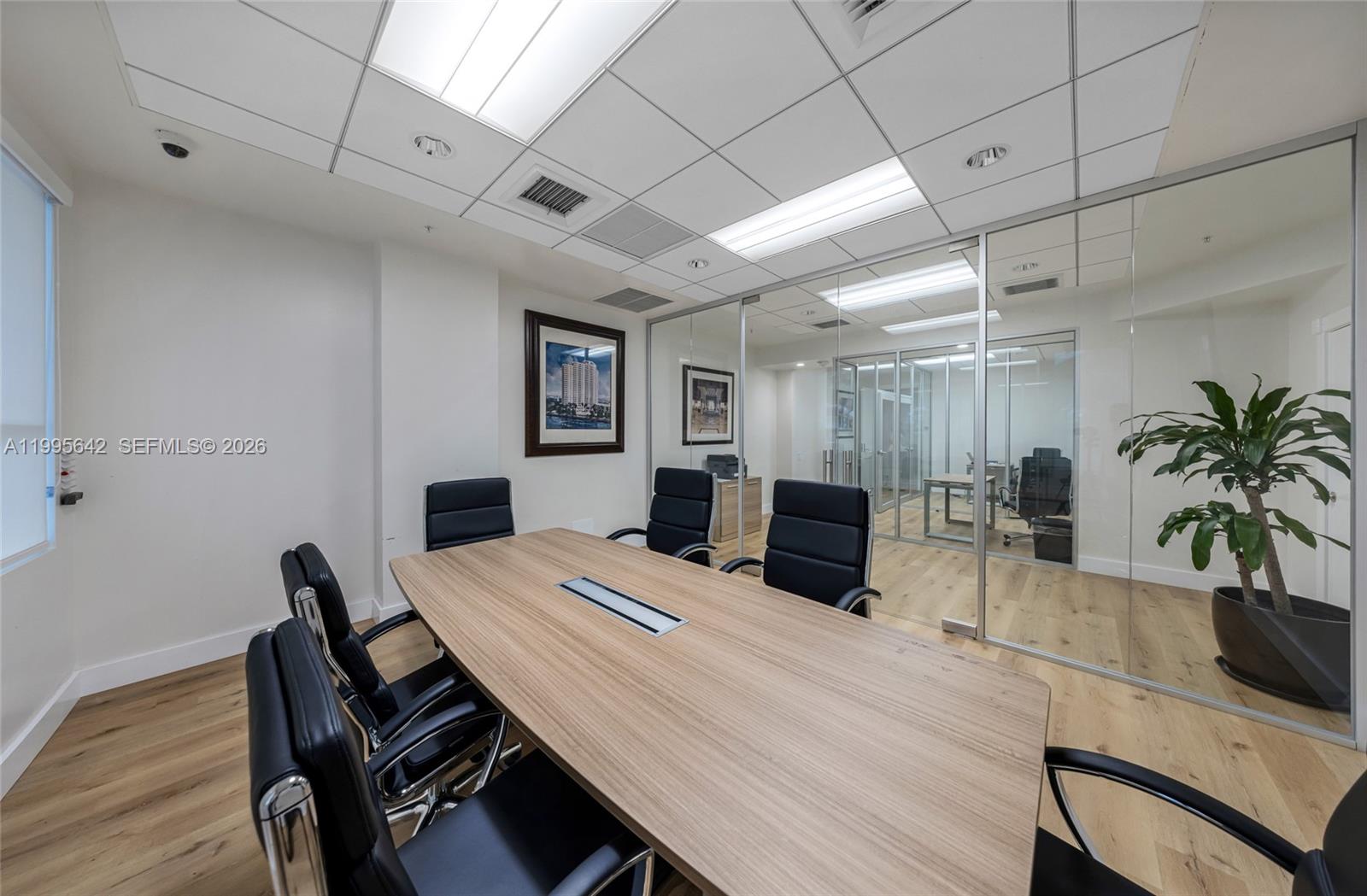 701 Brickell Key Boulevard, Unit 1112 Miami, FL 33131 - Photo 30 of 31 a view of a dining room with furniture