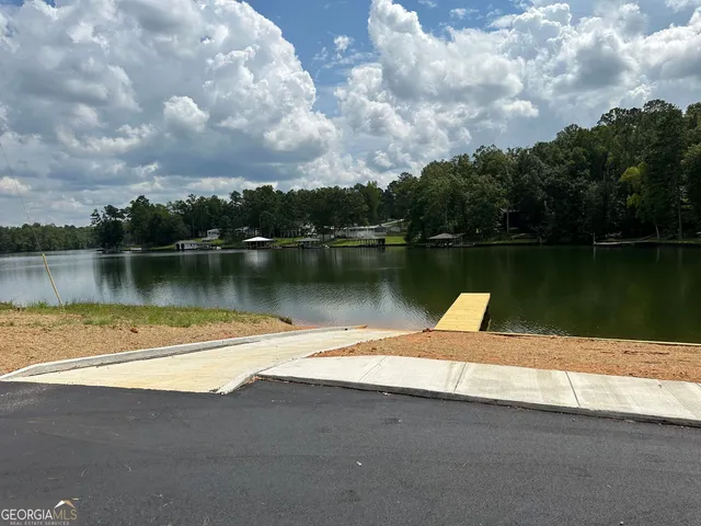 a view of a lake with a outdoor space