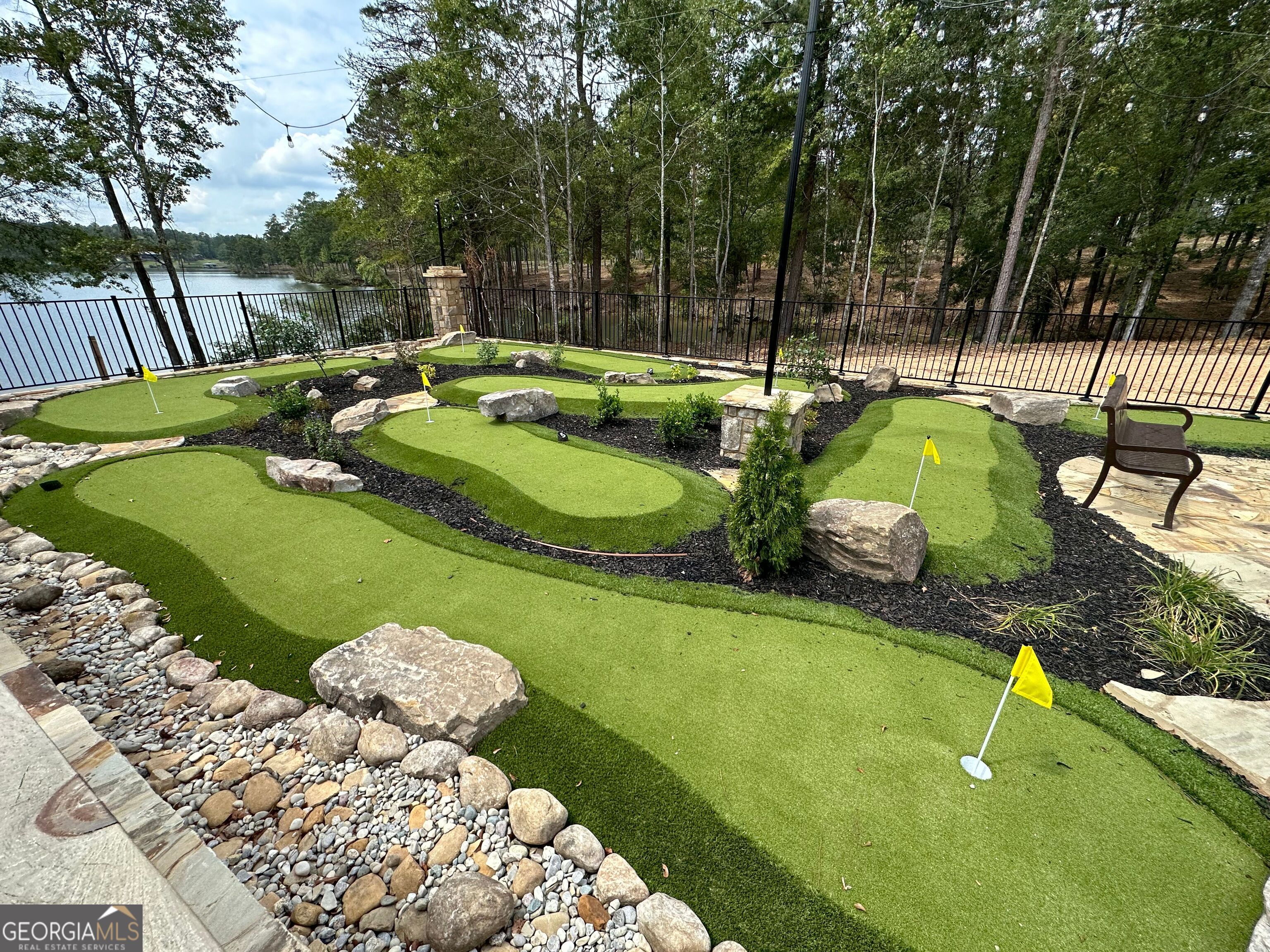 302 Wind Rock Ridge Northeast Milledgeville, GA 31061 - Photo 9 of 11 a view of swimming pool with a patio