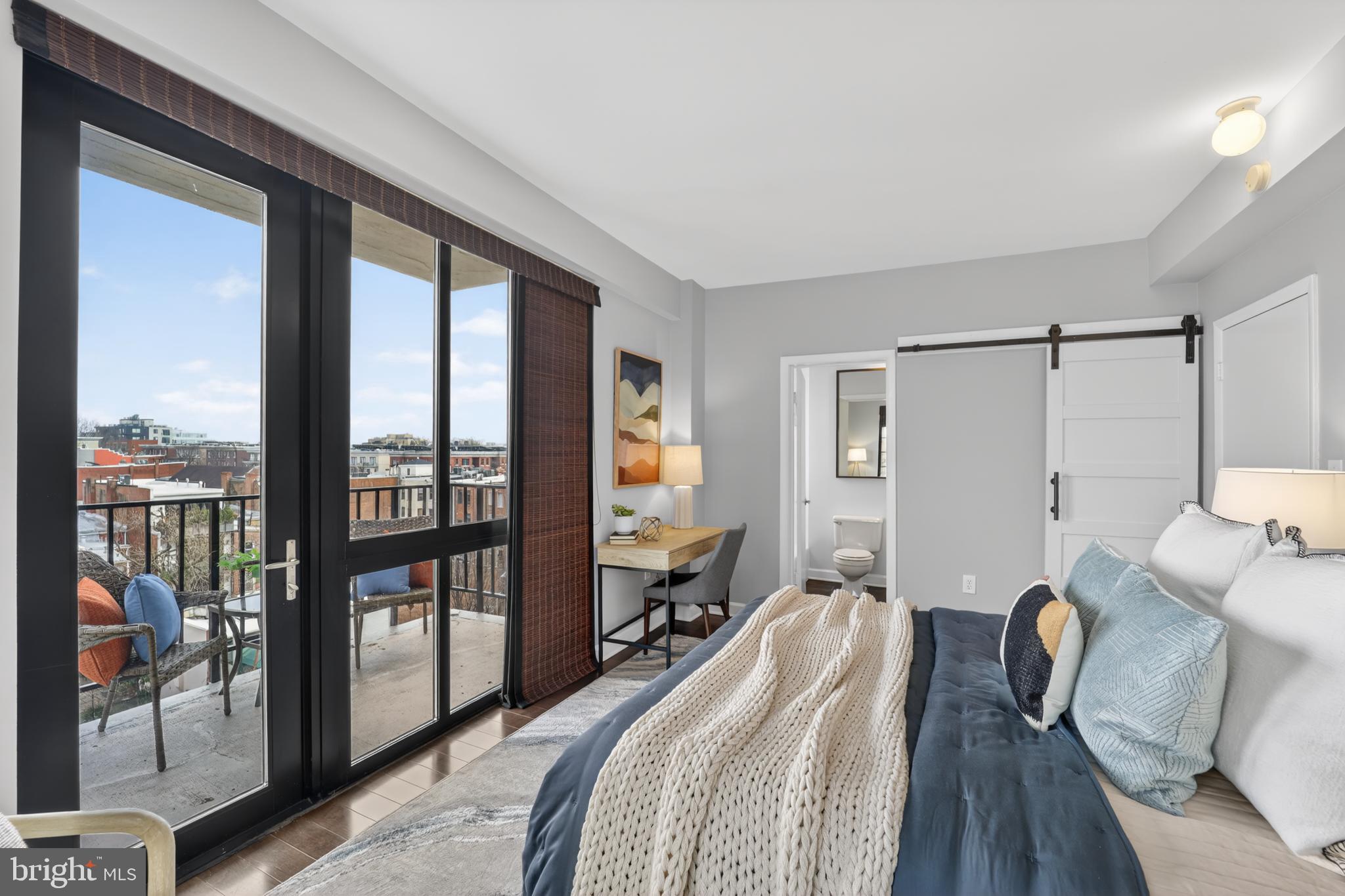 1701 16th Street Northwest, Unit 627 Washington, DC 20009 - Photo 16 of 29 Serene bedroom with balcony access.